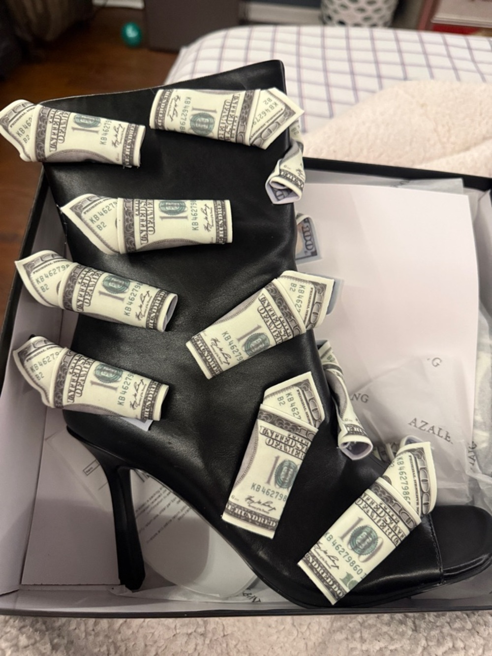 Stylish Black Ankle Booties with Money-Print Bow Accents